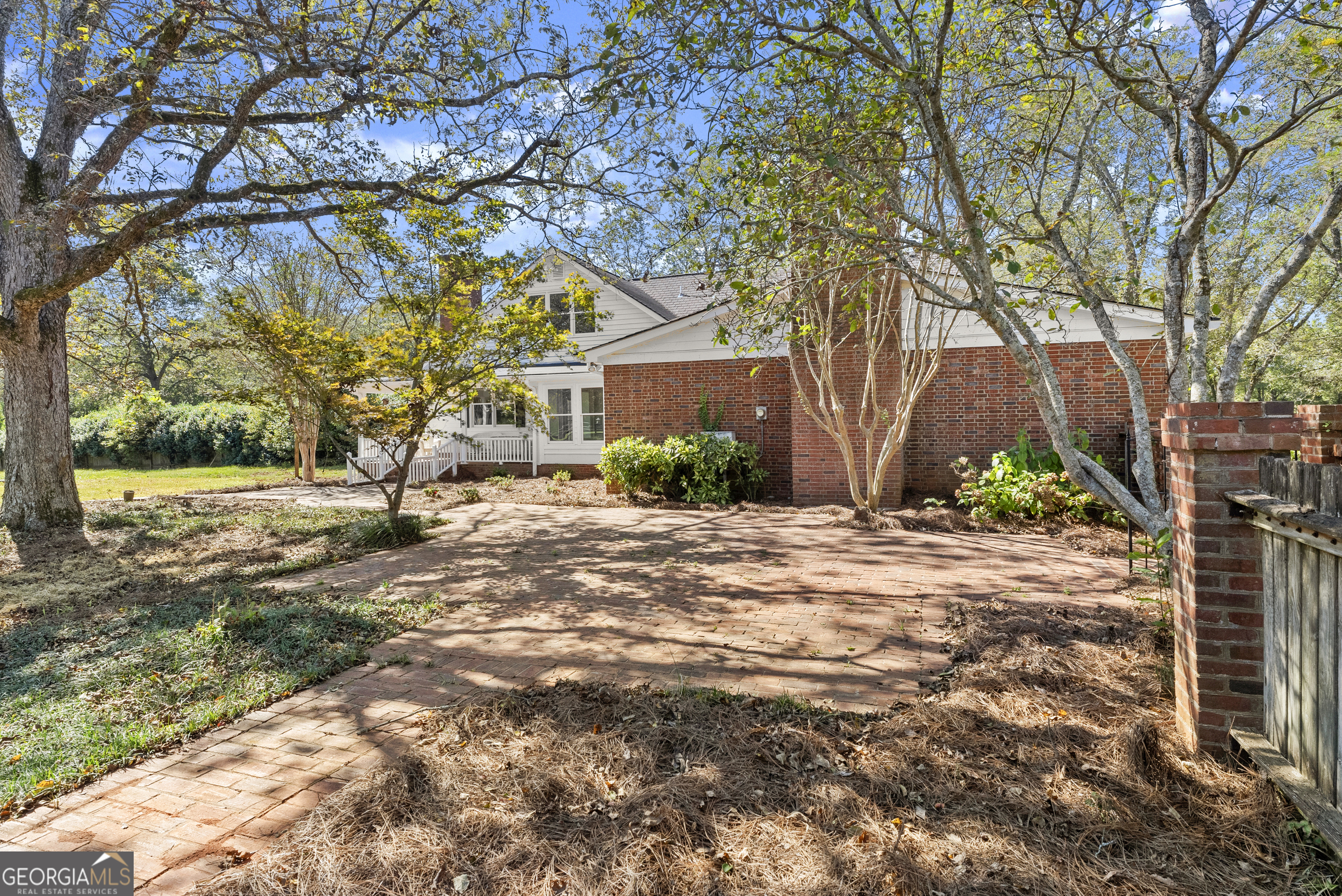 1972 Rest Haven Road Yatesville, GA 31097 - Photo 35 of 52 a view of a yard with plants and a large tree