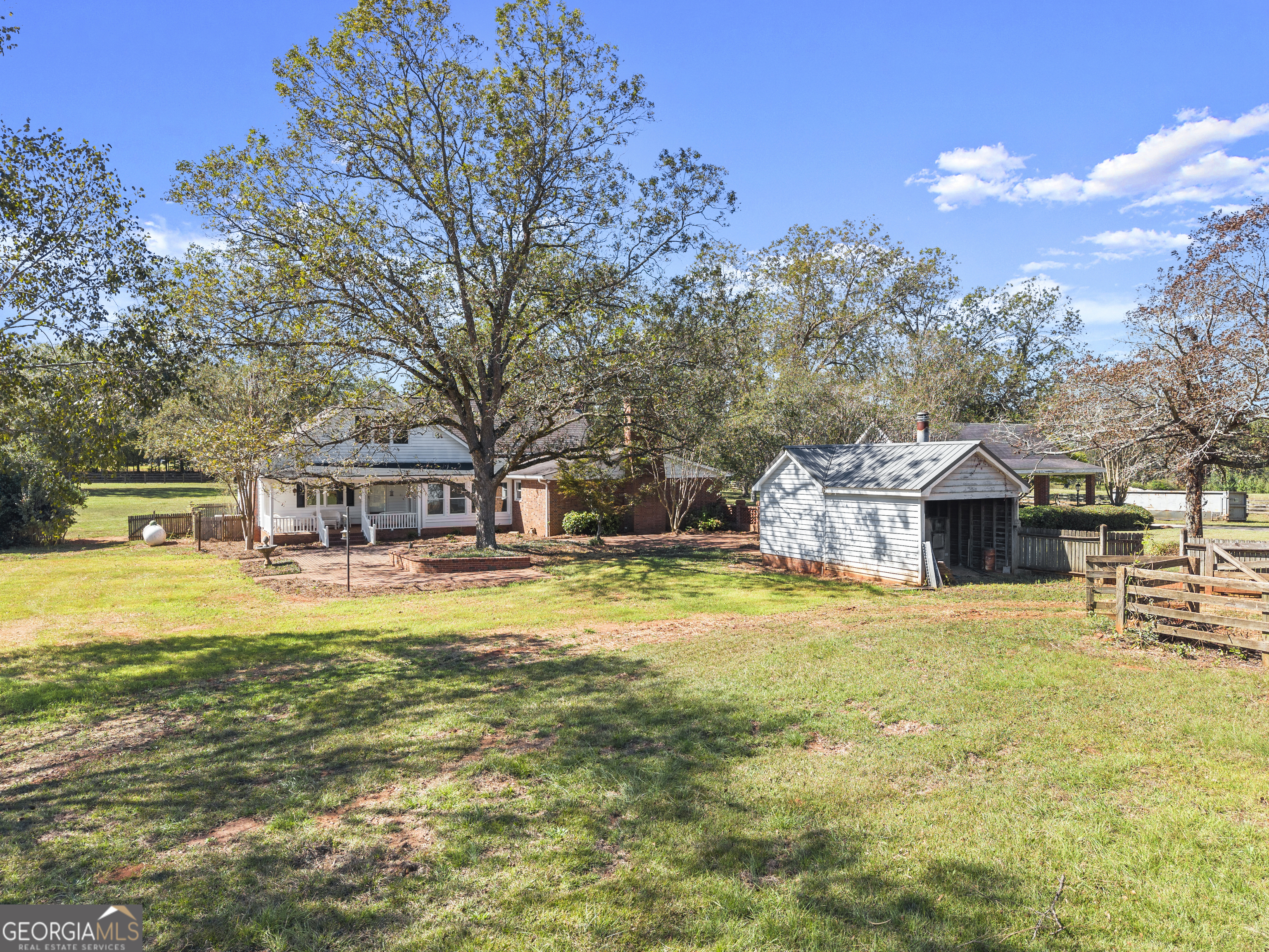 1972 Rest Haven Road Yatesville, GA 31097 - Photo 37 of 52 a house with swimming pool in front of it