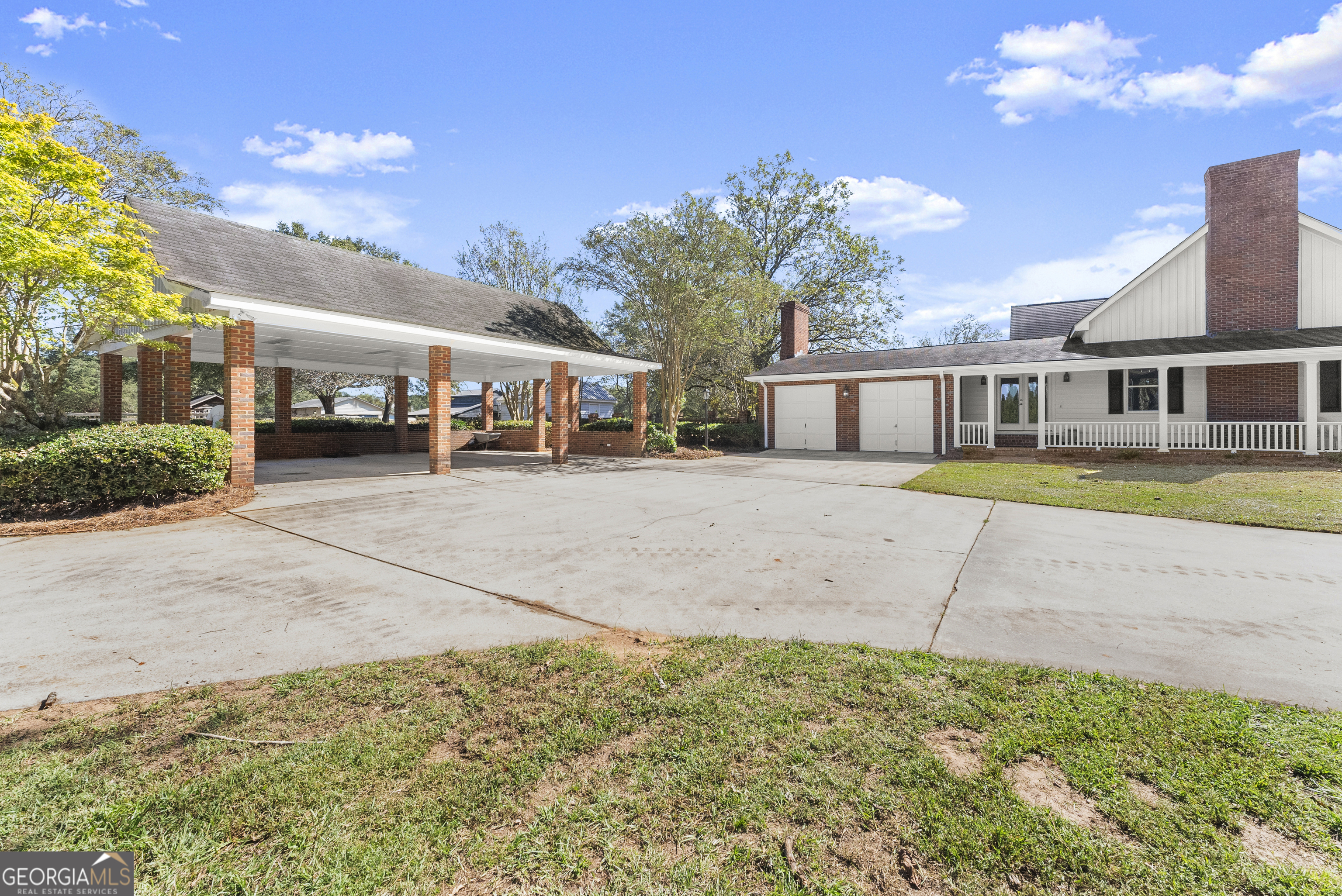1972 Rest Haven Road Yatesville, GA 31097 - Photo 38 of 52 a view of a big house with a street and a yard