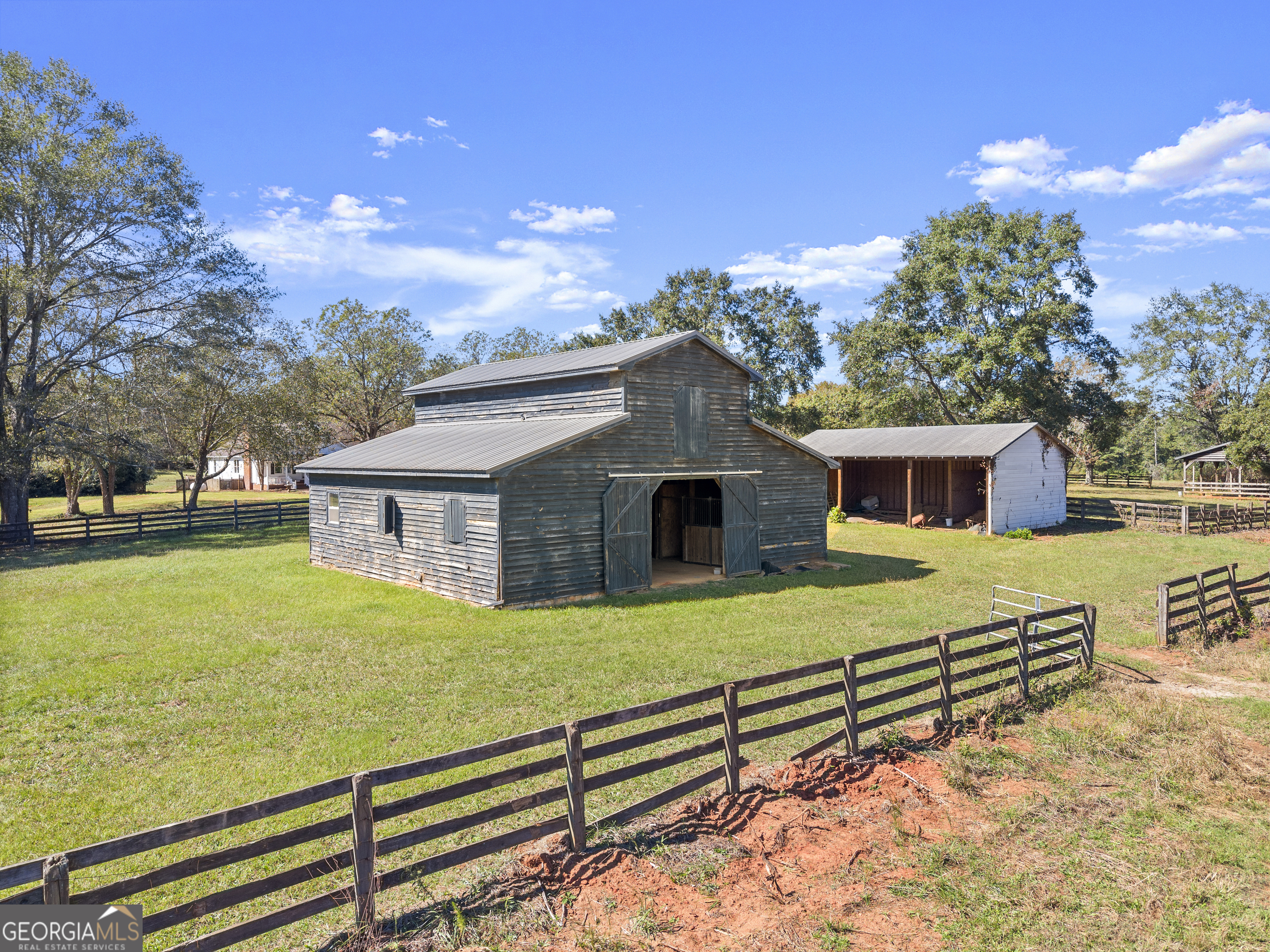 1972 Rest Haven Road Yatesville, GA 31097 - Photo 41 of 52 a view of a house with a yard