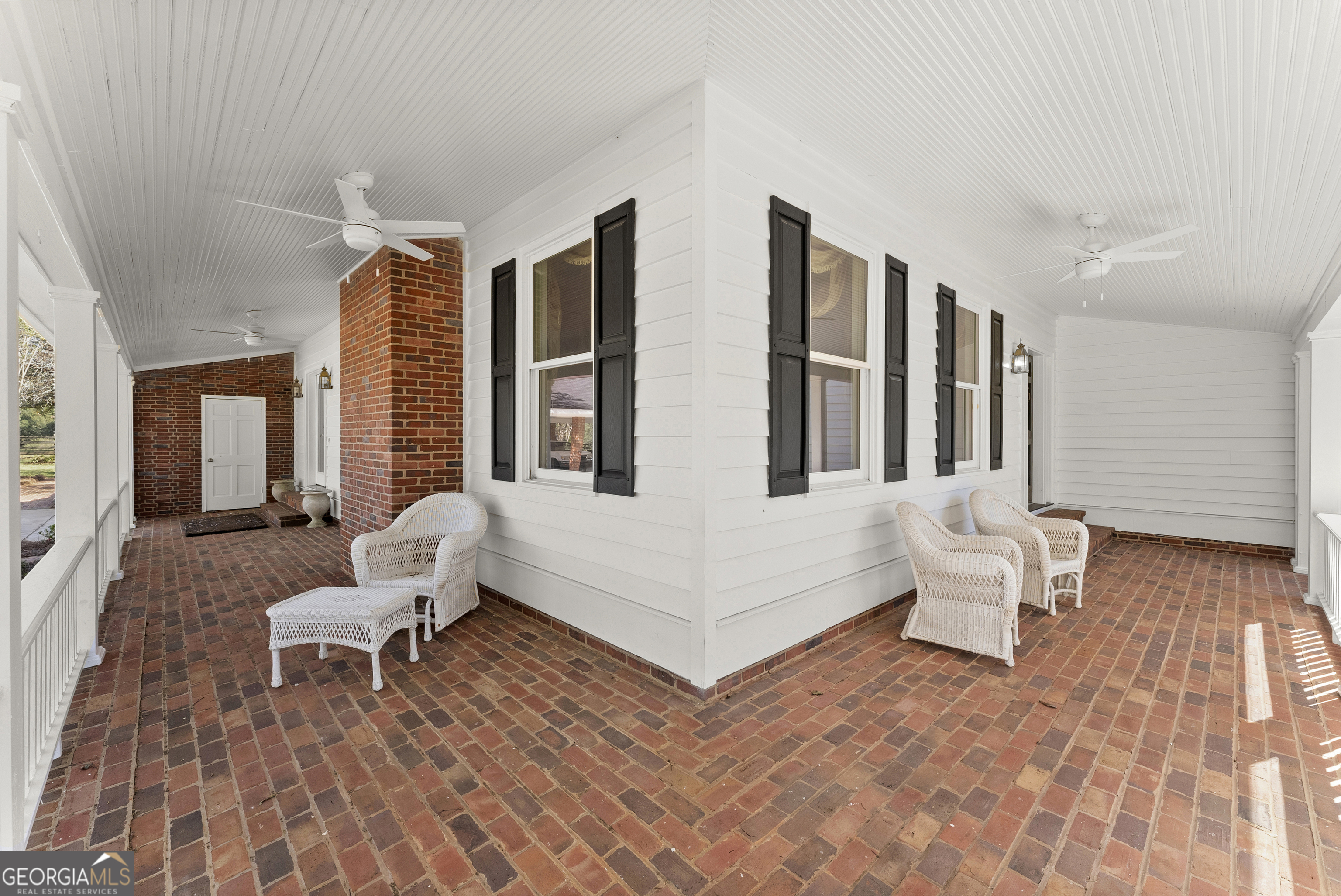 1972 Rest Haven Road Yatesville, GA 31097 - Photo 7 of 52 a living room with furniture and large windows