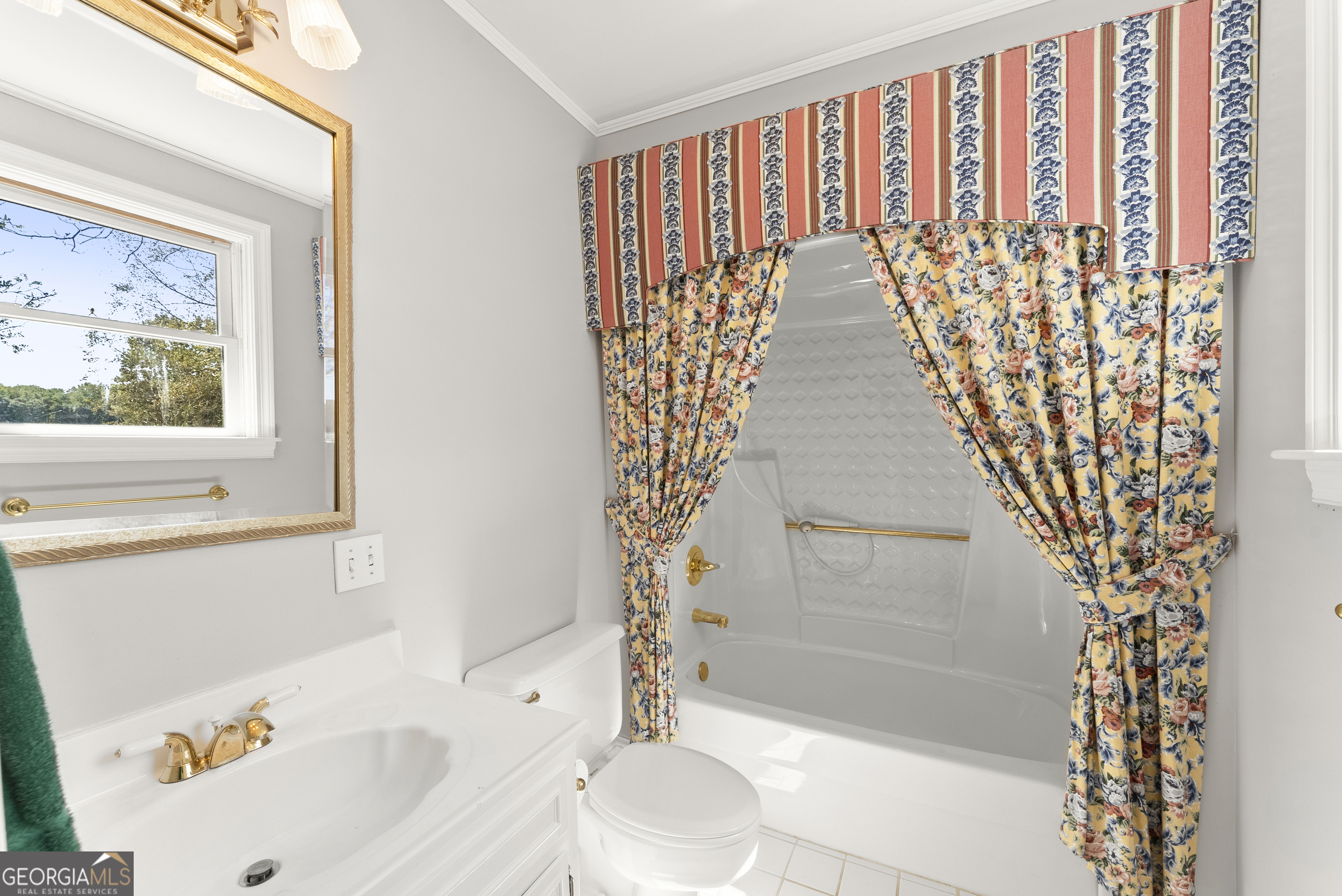 1972 Rest Haven Road Yatesville, GA 31097 - Photo 10 of 52 a bathroom with a bathtub and shower