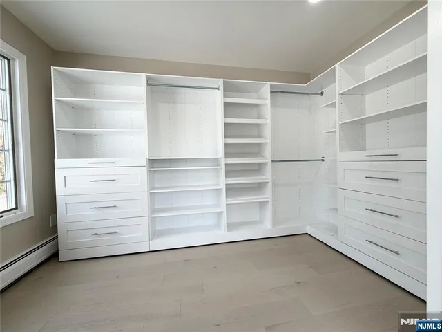 a view of an empty walk in closet