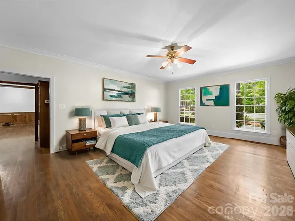 wooden floor with cabinets
