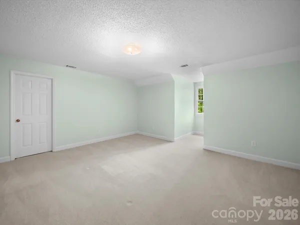 a bathroom with a shower and a toilet