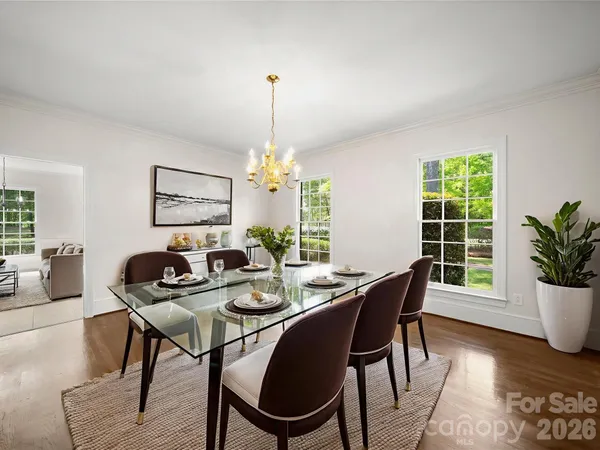 a kitchen with cabinets and stainless steel appliances