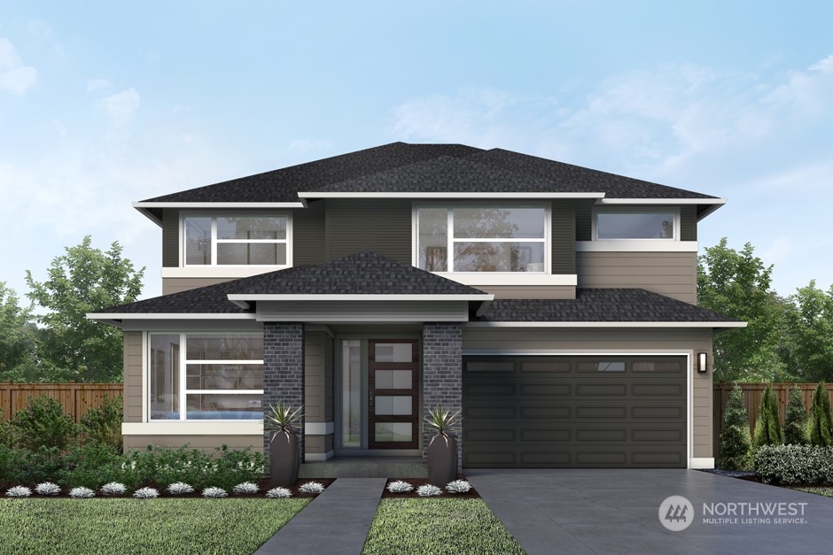 6559 Southeast 8th Street Renton, WA 98059 - Photo 1 of 6 a front view of a house with a yard