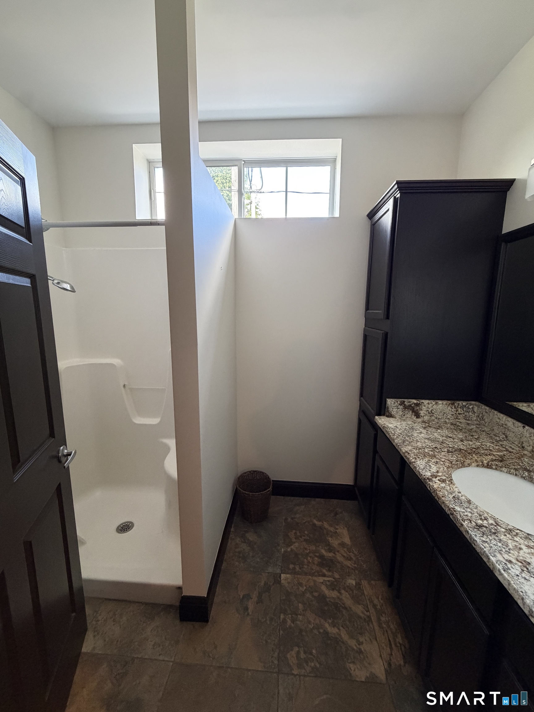10 Summit Street, Unit 1 East Hampton, CT 06424 - Photo 11 of 14 a bathroom with a granite countertop sink and a mirror