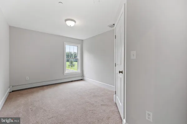 a bathroom with a sink vanity and a mirror
