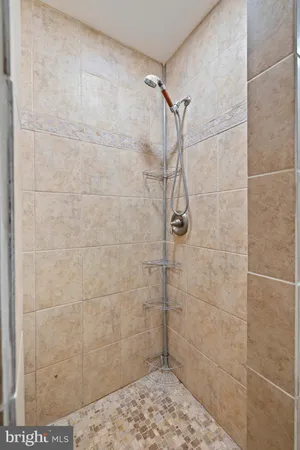 a aerial view of a house with yard and sitting area