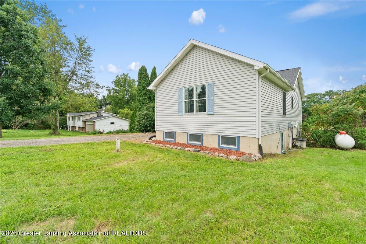 3956 Aurelius Road Onondaga, MI 49264 - Photo 3 of 47 04-Media Jett -44