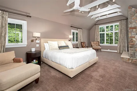 a bed room with a bed and a couch