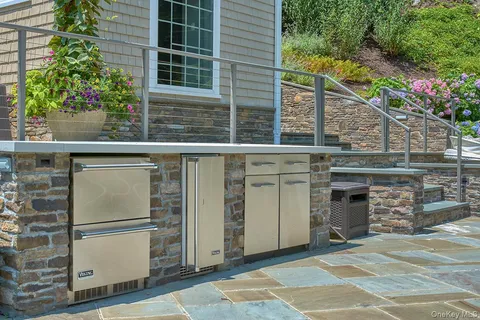 a view of a garage with an outdoor space