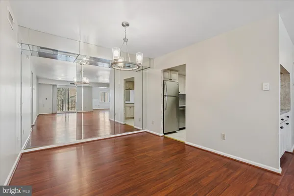 a view of a livingroom with wooden floor