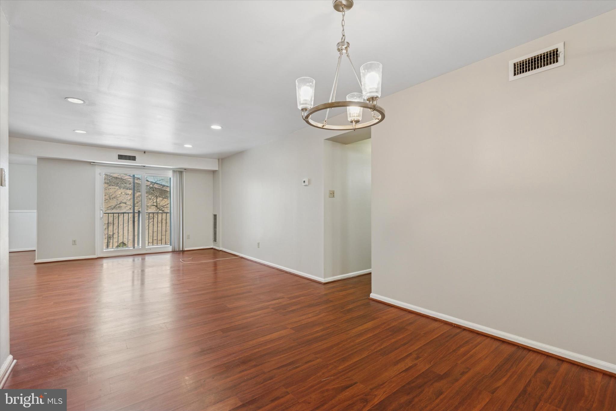3204 Delaire Landing Road, Unit 3204 Philadelphia, PA 19114 - Photo 12 of 25 Spacious room with warm wood floors.