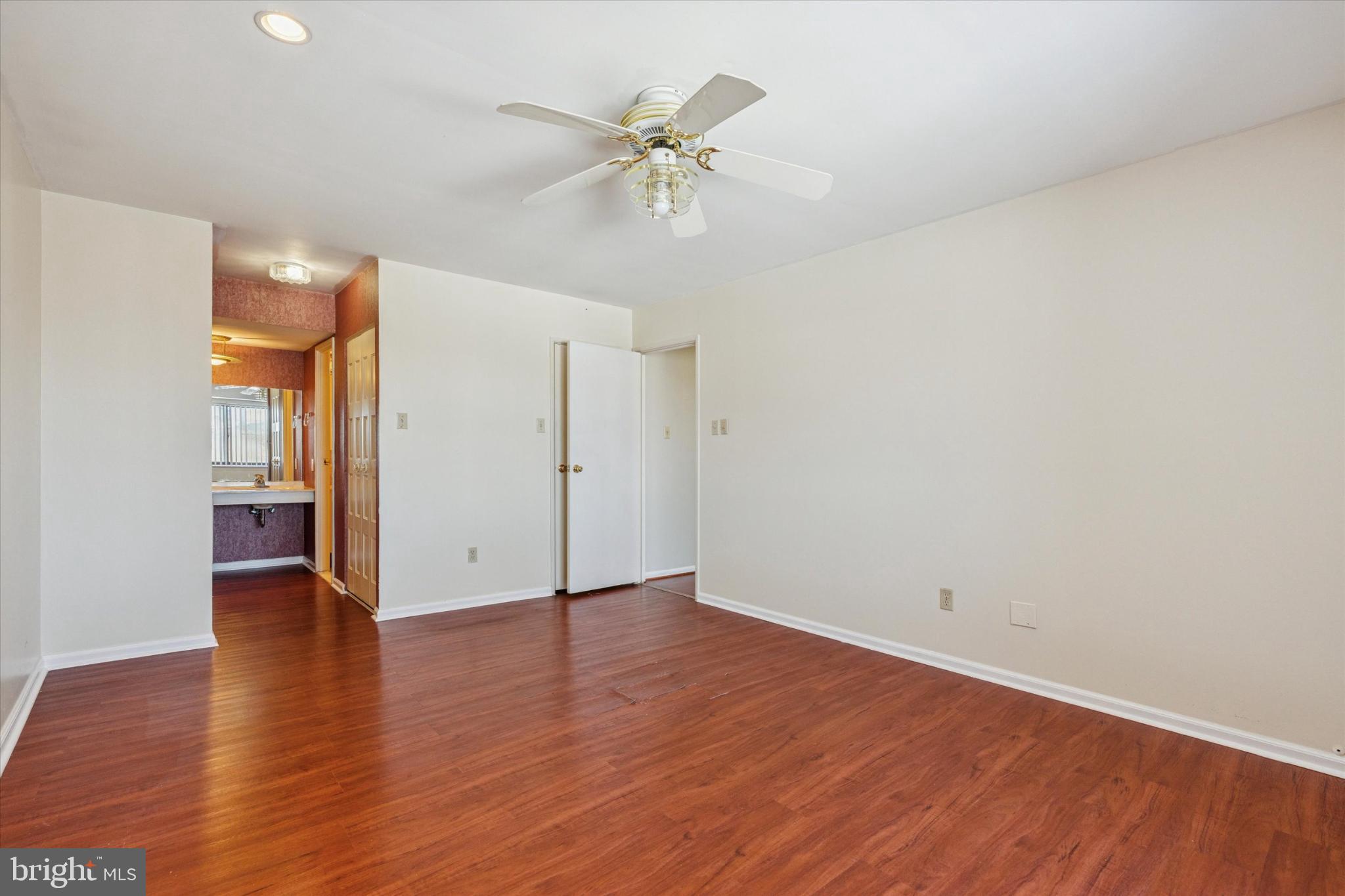 3204 Delaire Landing Road, Unit 3204 Philadelphia, PA 19114 - Photo 17 of 25 Spacious room with warm wood flooring.