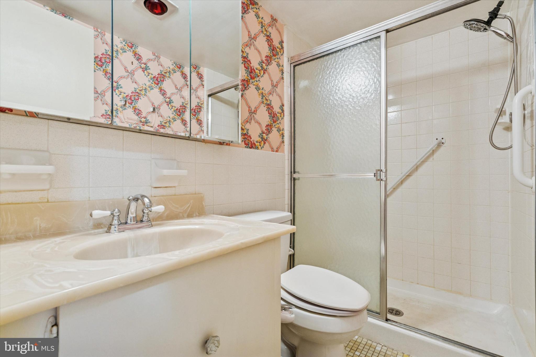 3204 Delaire Landing Road, Unit 3204 Philadelphia, PA 19114 - Photo 19 of 25 Charming bathroom with vintage floral accents.
