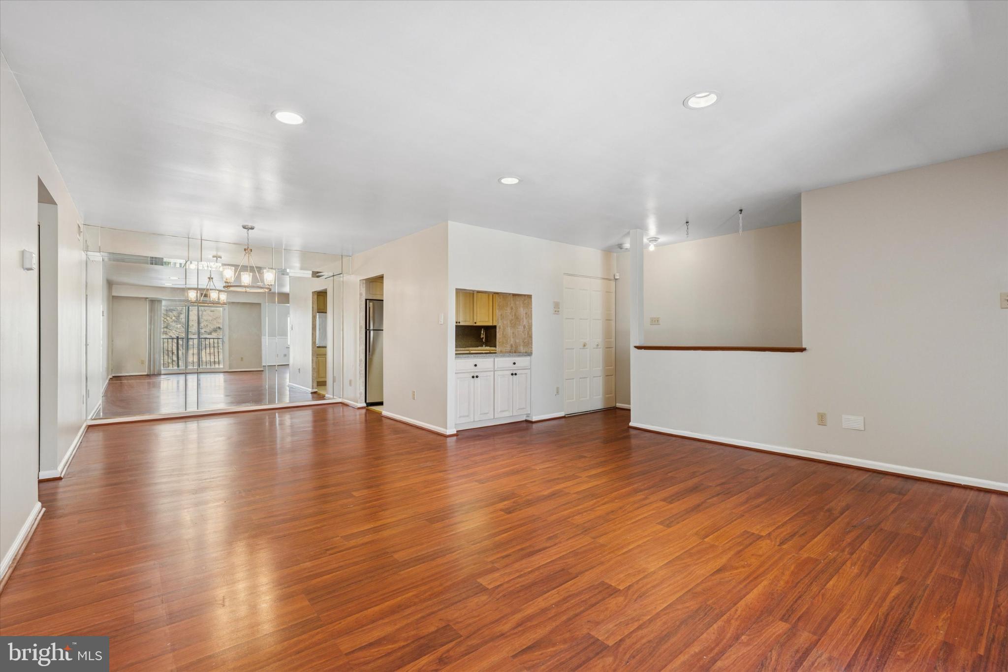 3204 Delaire Landing Road, Unit 3204 Philadelphia, PA 19114 - Photo 4 of 25 Spacious open layout with warm wood floors.
