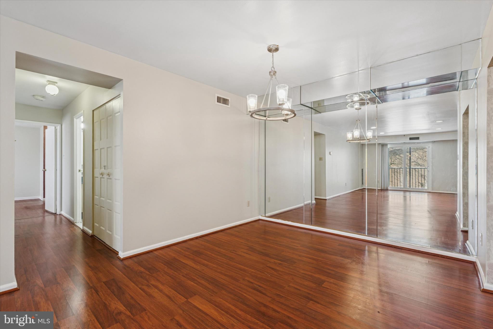 3204 Delaire Landing Road, Unit 3204 Philadelphia, PA 19114 - Photo 8 of 25 Spacious room with elegant mirrored accents.
