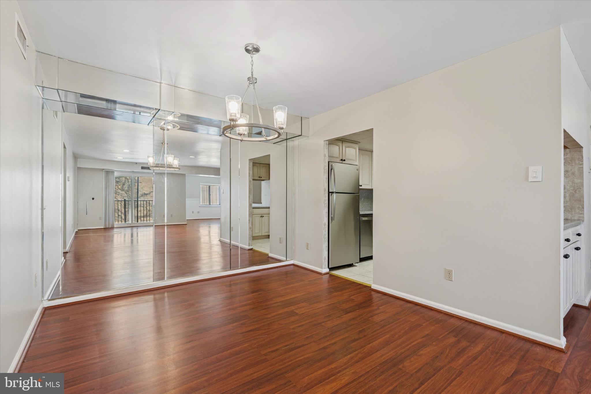 3204 Delaire Landing Road, Unit 3204 Philadelphia, PA 19114 - Photo 9 of 25 Spacious, light-filled living area with elegance.
