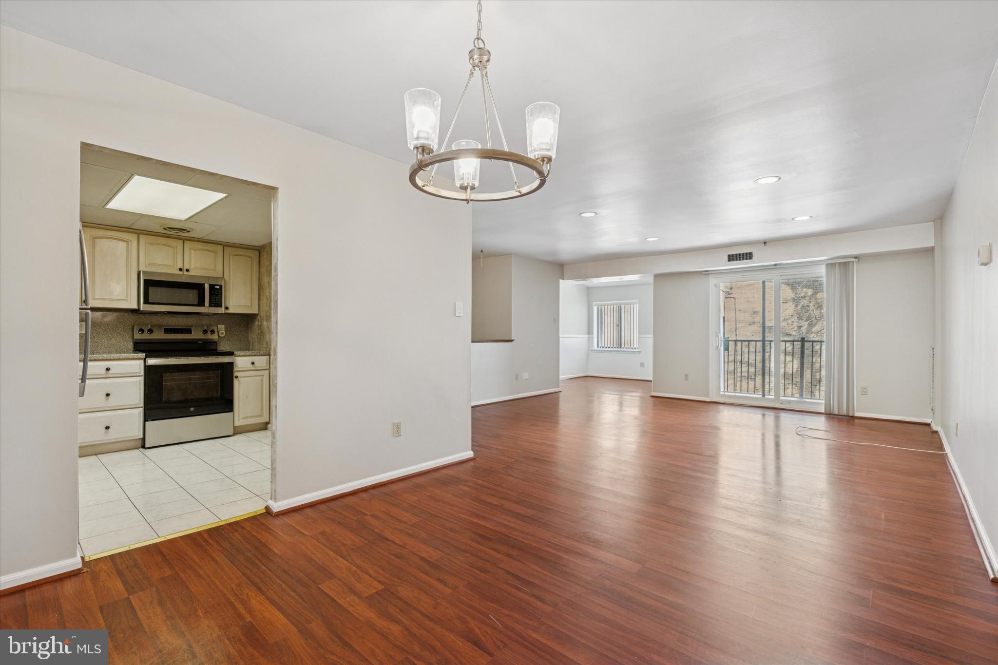 3204 Delaire Landing Road, Unit 3204 Philadelphia, PA 19114 - Photo 10 of 25 Spacious living area with natural light.