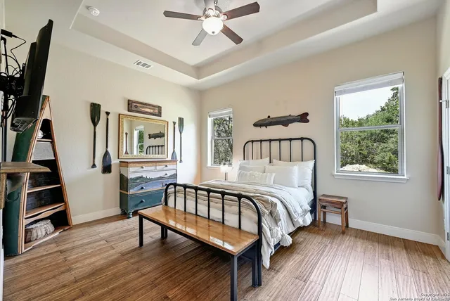 a bedroom with a bed furniture and a window