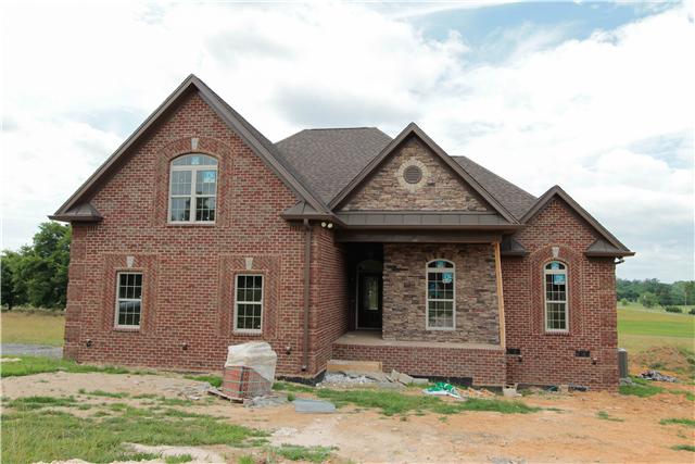 776 Academy Road, Unit 6C Lebanon, TN 37087 - Photo 1 of 16 a front view of a house with garden