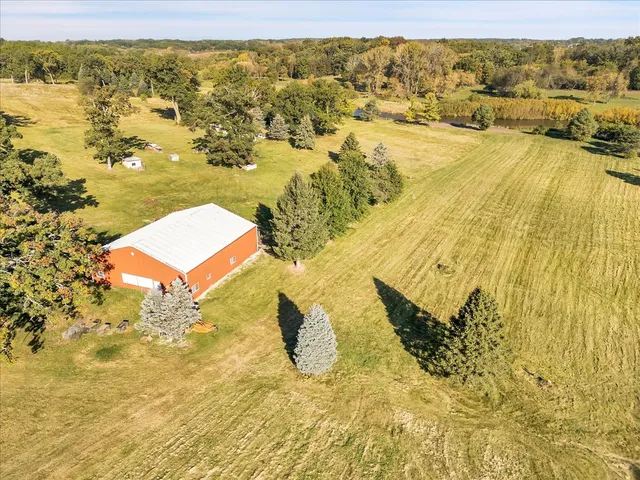 a view of a field with an trees