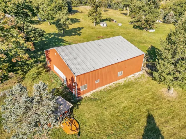 a view of a house with a garden