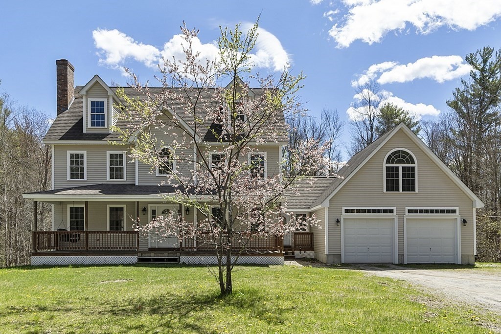 214 Hastings Road Ashburnham, MA 01430 - Photo 2 of 39 a front view of house with yard