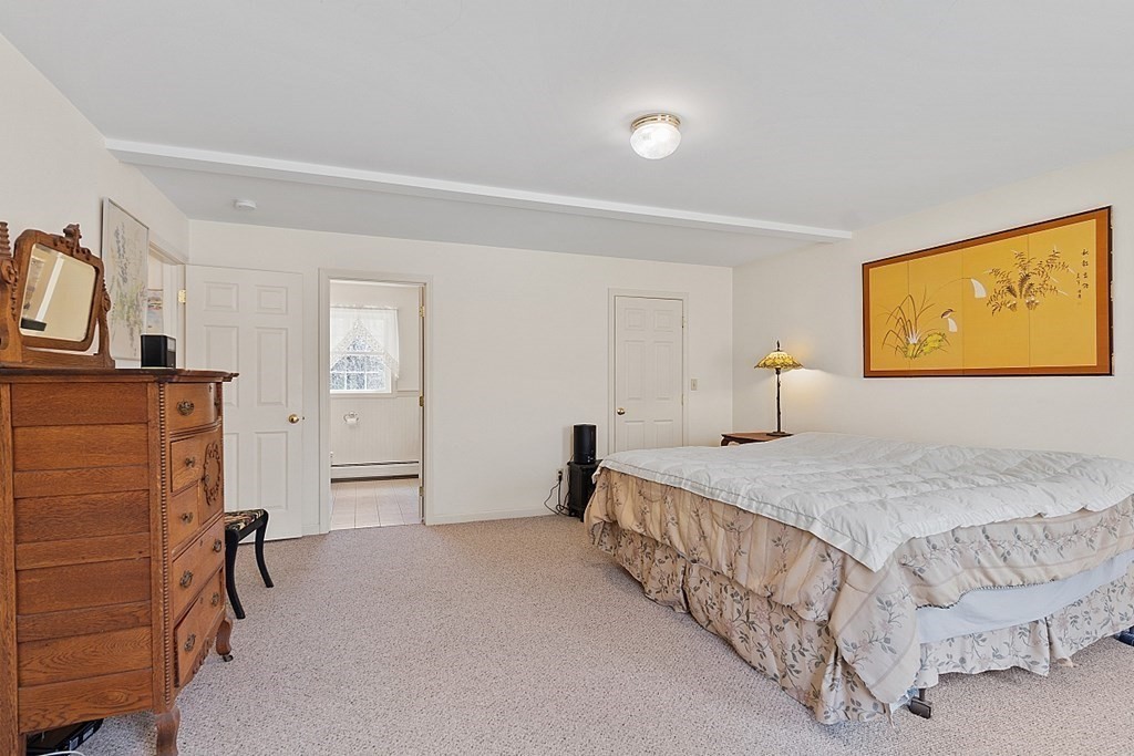 214 Hastings Road Ashburnham, MA 01430 - Photo 22 of 39 a bedroom with a bed and dresser