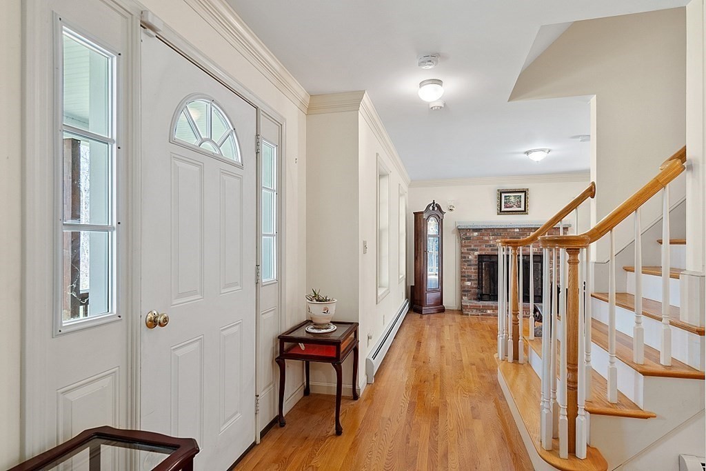 214 Hastings Road Ashburnham, MA 01430 - Photo 5 of 39 a view of a hallway with wooden floor and entryway