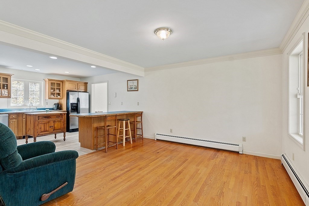 214 Hastings Road Ashburnham, MA 01430 - Photo 6 of 39 a view of a livingroom with furniture and wooden floor