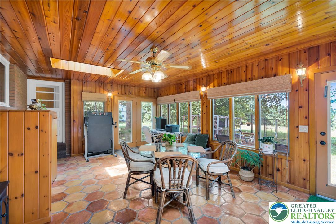 5747 Kernsville Road Orefield, PA 18069 - Photo 23 of 56 a view of a patio with a table and chairs