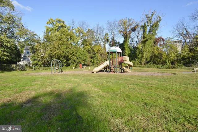 a view of a green field with clear sky