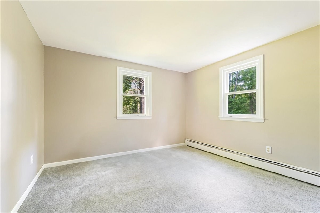 152 Alley Road Rochester, MA 02770 - Photo 17 of 26 an empty room with a window