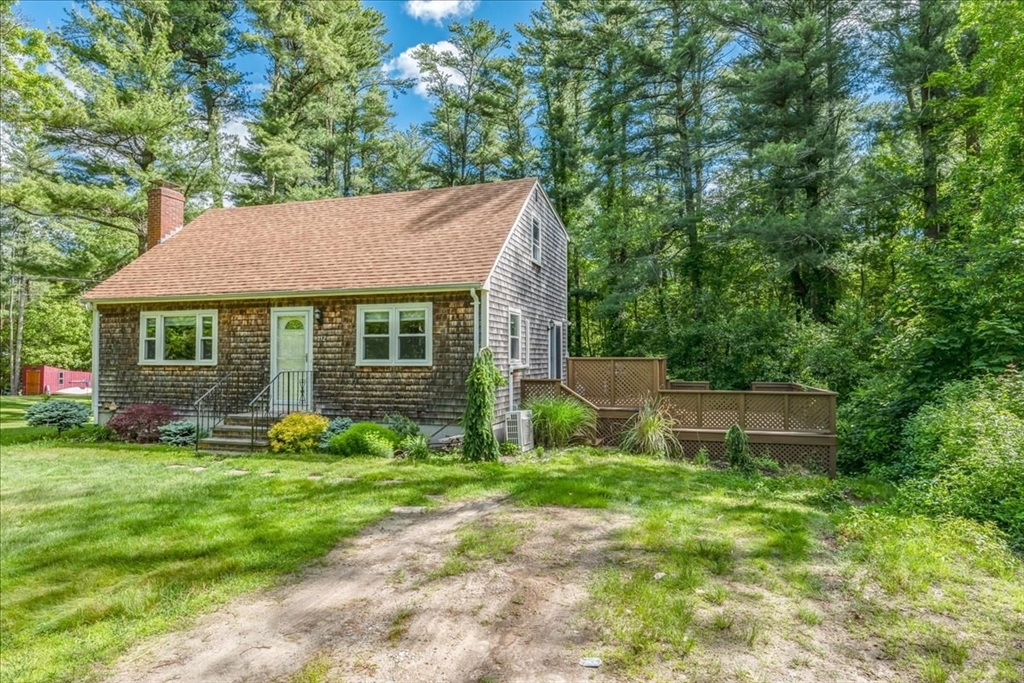 152 Alley Road Rochester, MA 02770 - Photo 3 of 26 a view of a house with a yard and sitting area