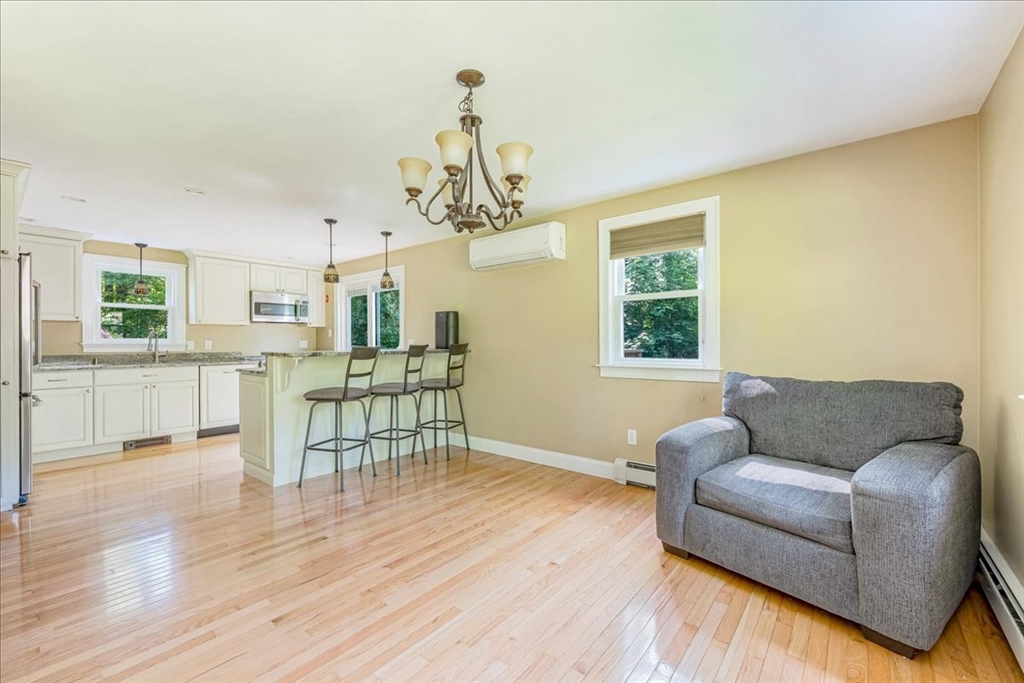 152 Alley Road Rochester, MA 02770 - Photo 4 of 26 a living room with furniture and a wooden floor