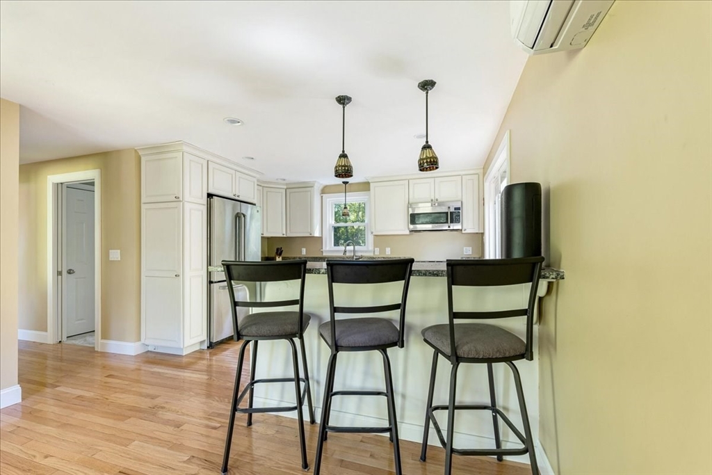 152 Alley Road Rochester, MA 02770 - Photo 6 of 26 a dining room with furniture and wooden floor