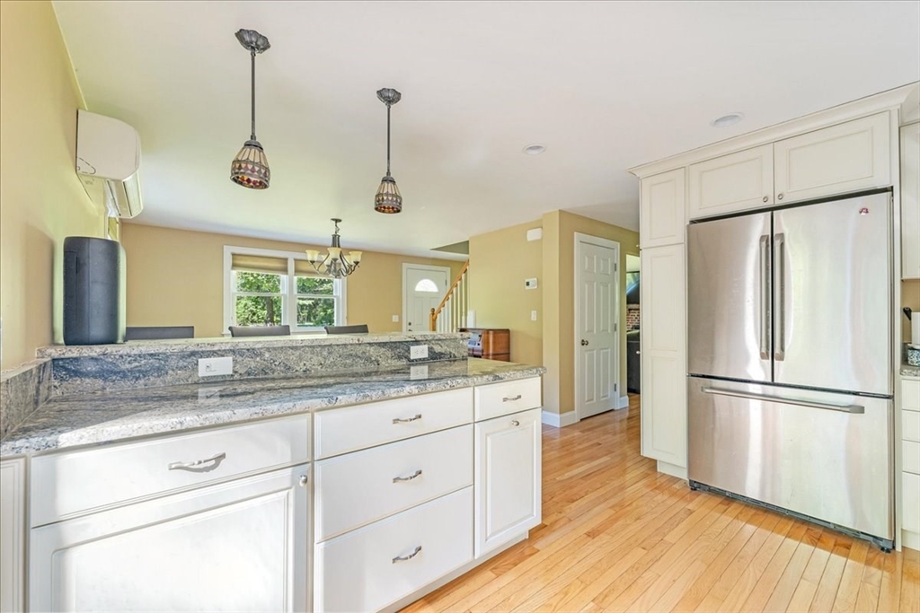 152 Alley Road Rochester, MA 02770 - Photo 7 of 26 a kitchen with a refrigerator a sink and dishwasher