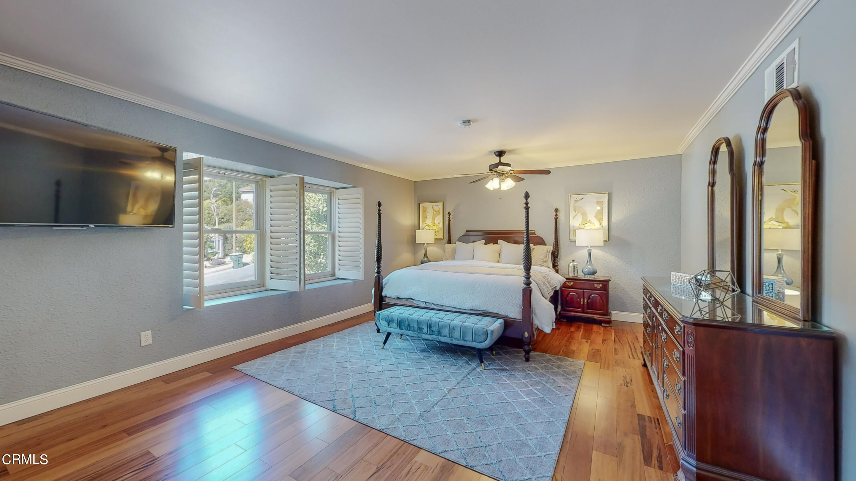 2124 Lenore Drive Glendale, CA 91206 - Photo 19 of 33 a spacious bedroom with a bed a couch and dresser