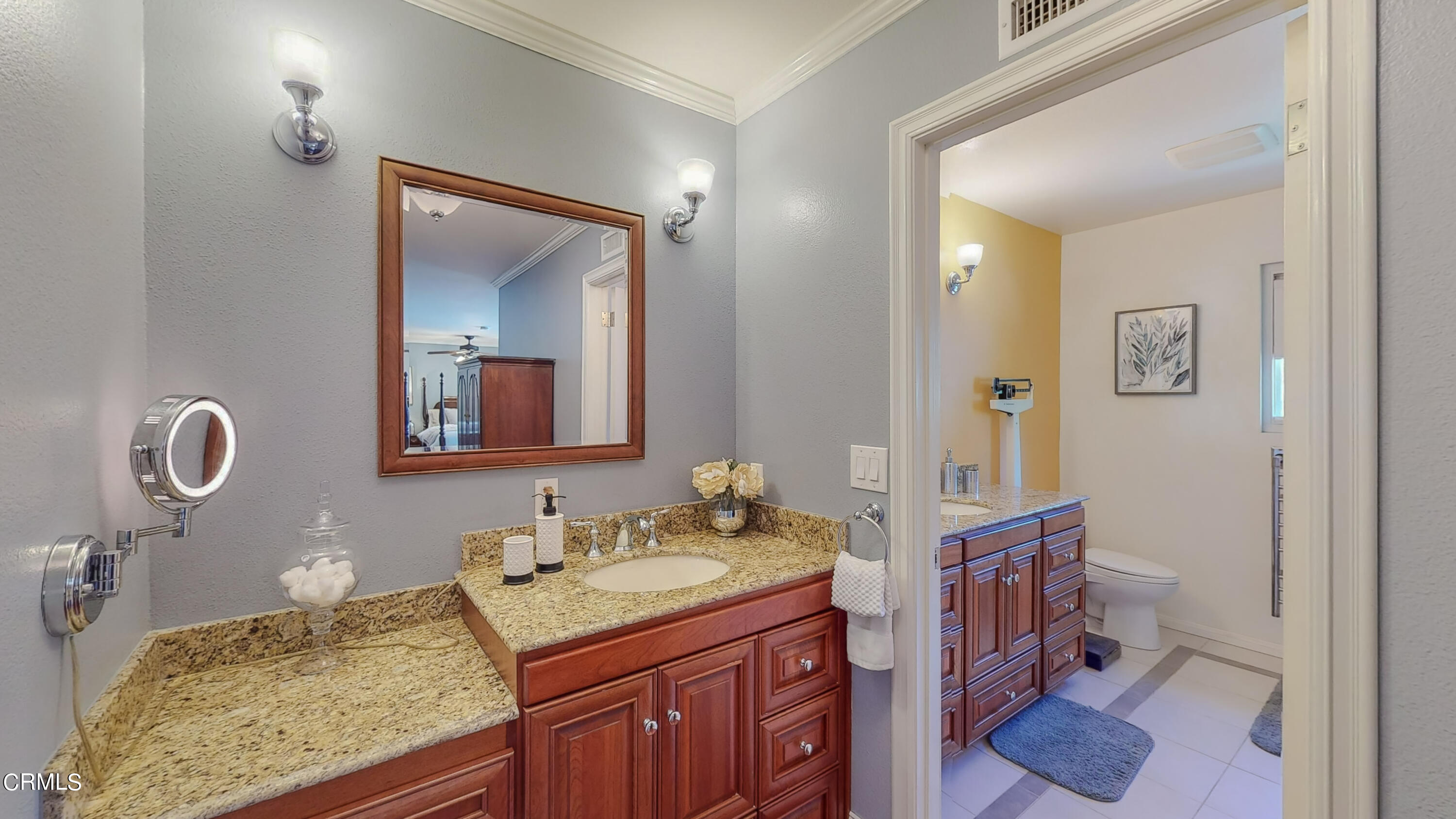 2124 Lenore Drive Glendale, CA 91206 - Photo 21 of 33 a en suite bathroom with a granite countertop sink and a mirror