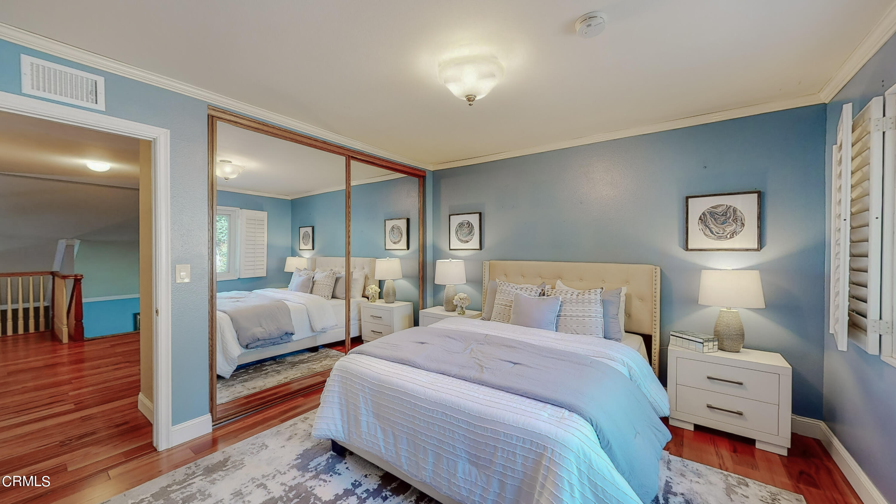 2124 Lenore Drive Glendale, CA 91206 - Photo 24 of 33 a bedroom with a bed and a lamp