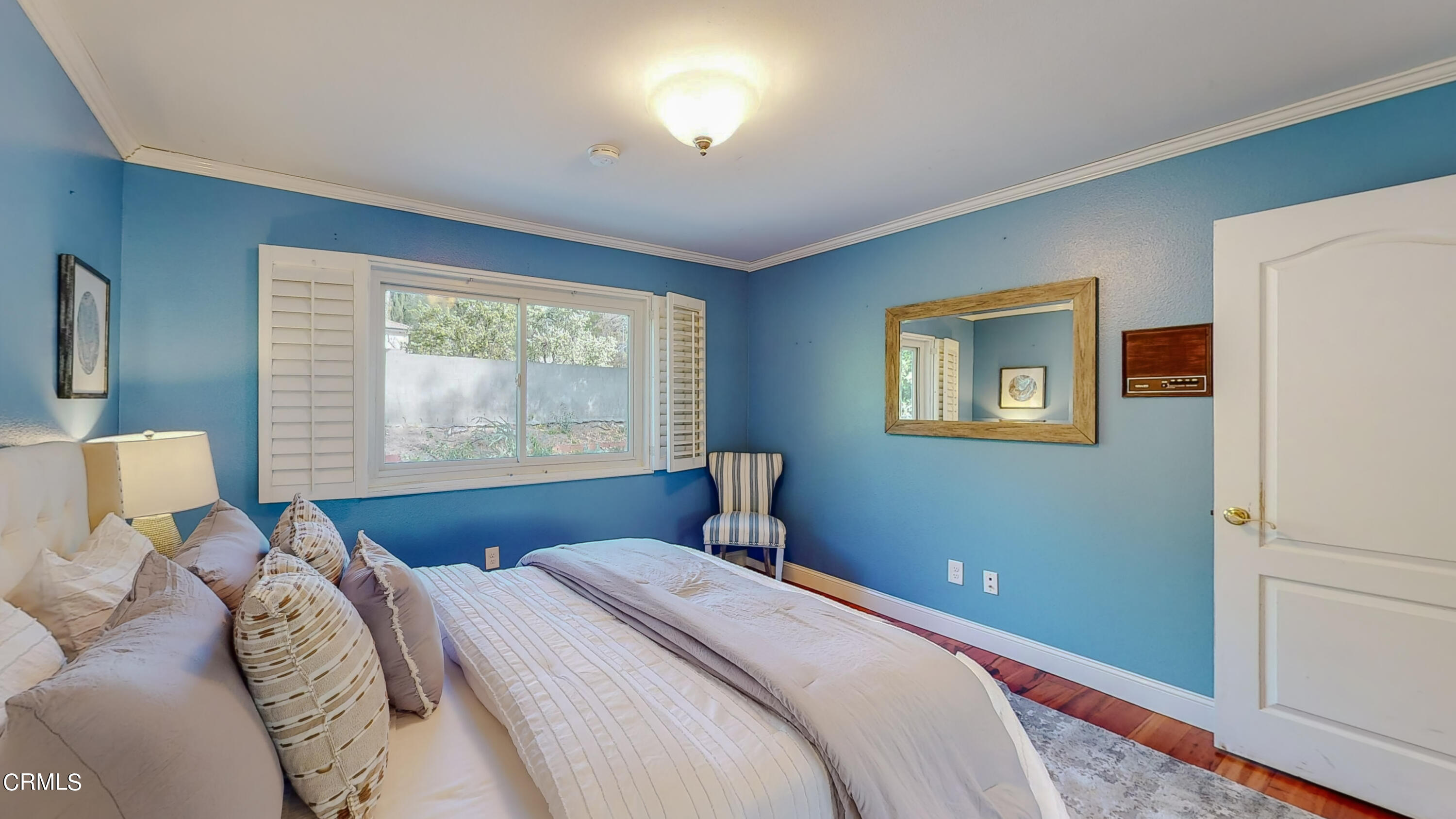 2124 Lenore Drive Glendale, CA 91206 - Photo 25 of 33 a bedroom with a bed and a window