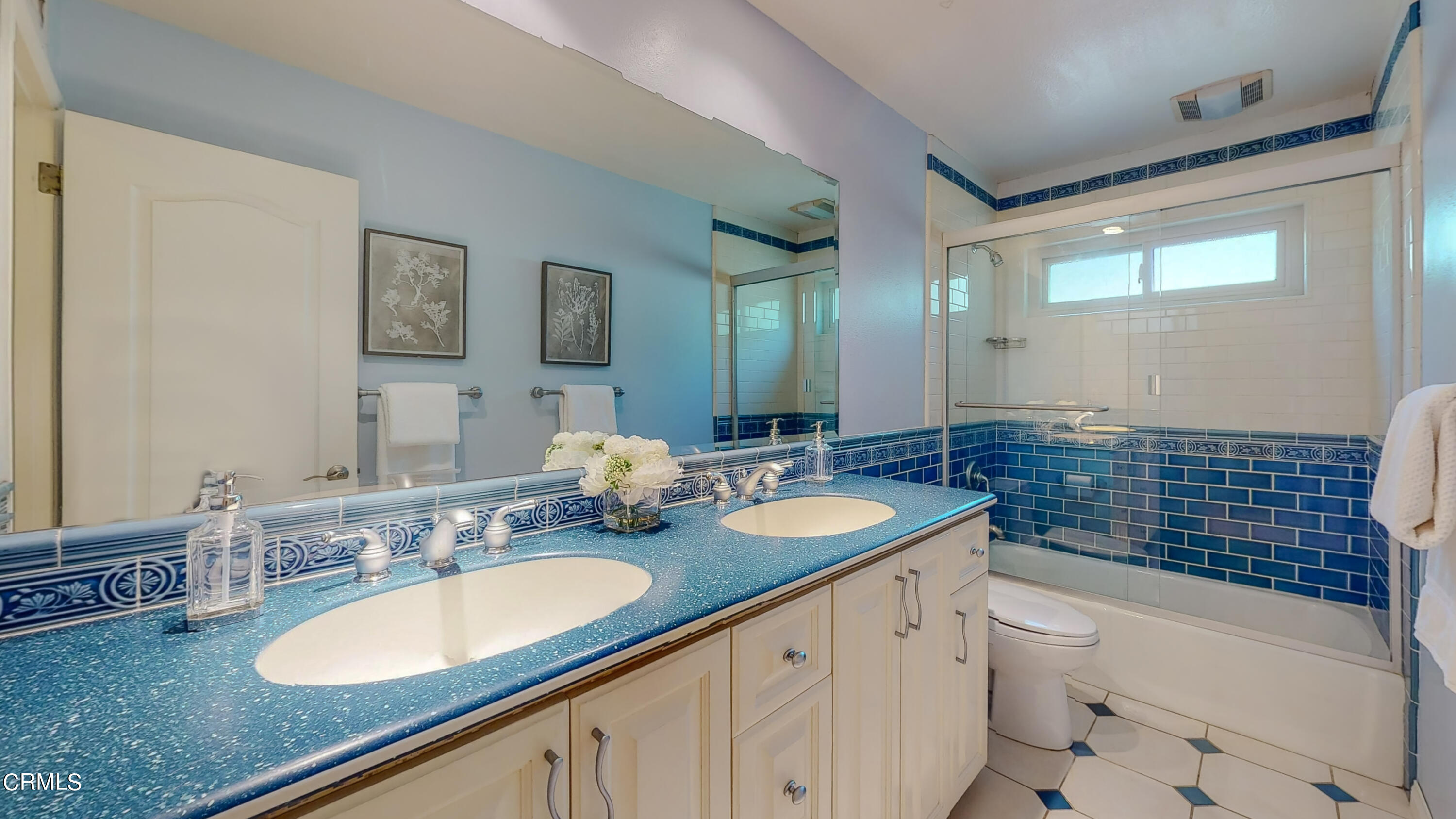 2124 Lenore Drive Glendale, CA 91206 - Photo 26 of 33 a bathroom with a sink double vanity granite tub toilet and a mirror