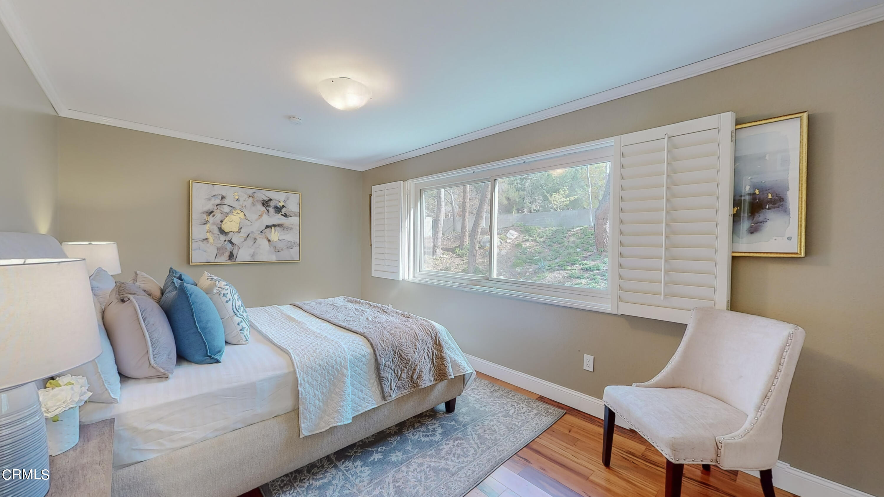 2124 Lenore Drive Glendale, CA 91206 - Photo 27 of 33 a bedroom with a bed and a chair