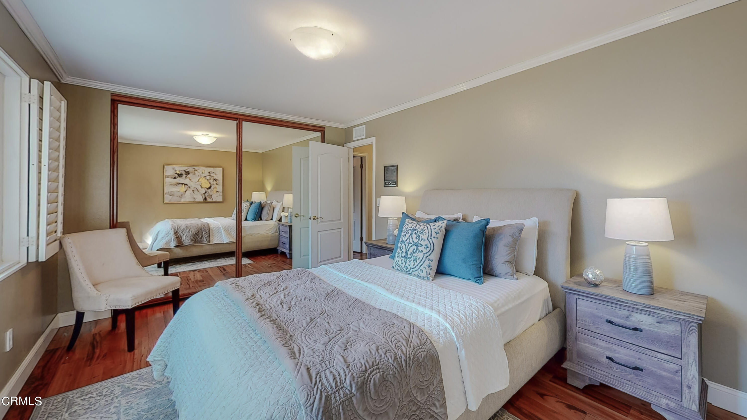 2124 Lenore Drive Glendale, CA 91206 - Photo 28 of 33 a bedroom with a bed a lamp and a large window