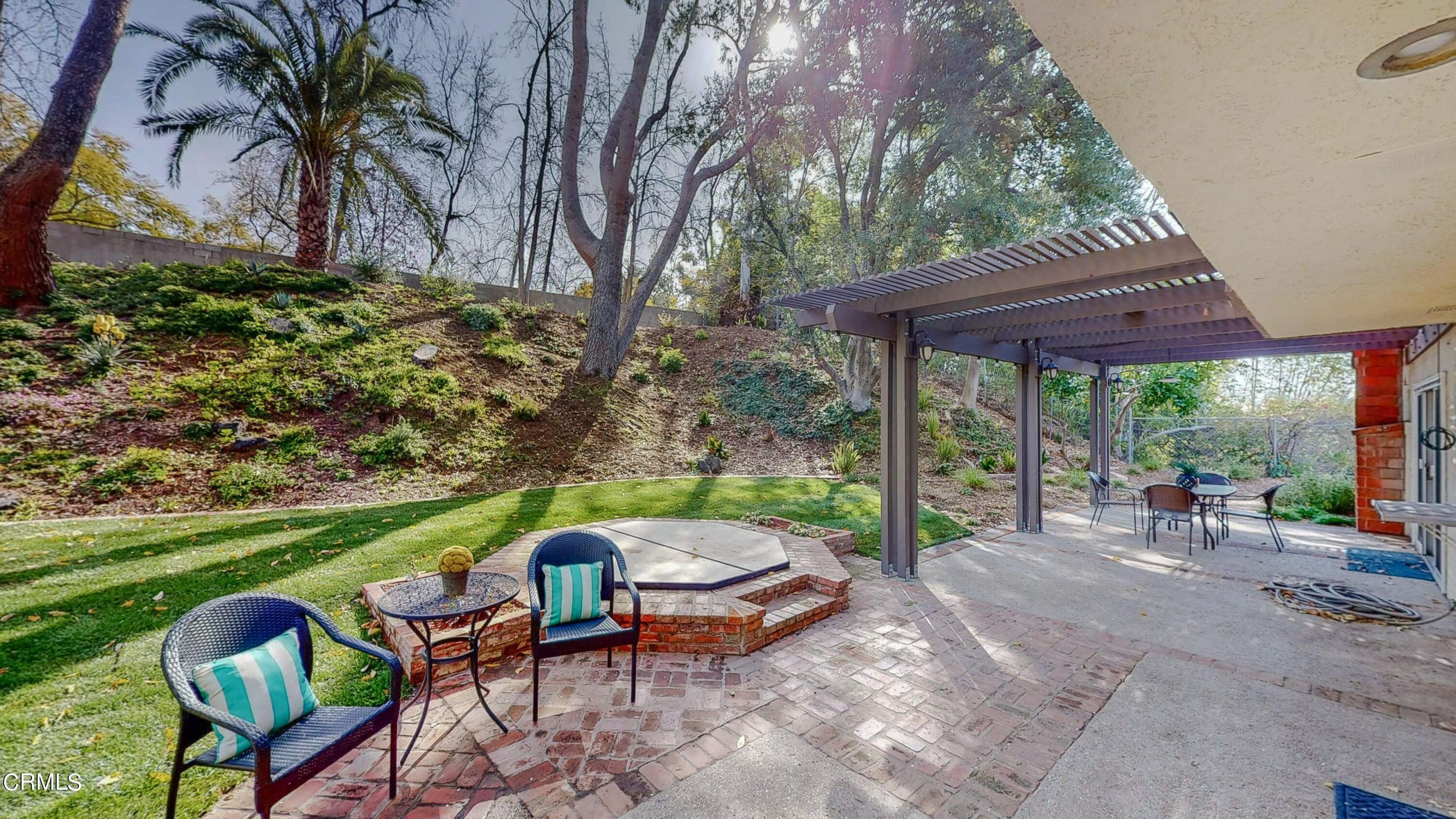 2124 Lenore Drive Glendale, CA 91206 - Photo 30 of 33 a backyard of a house with table and chairs