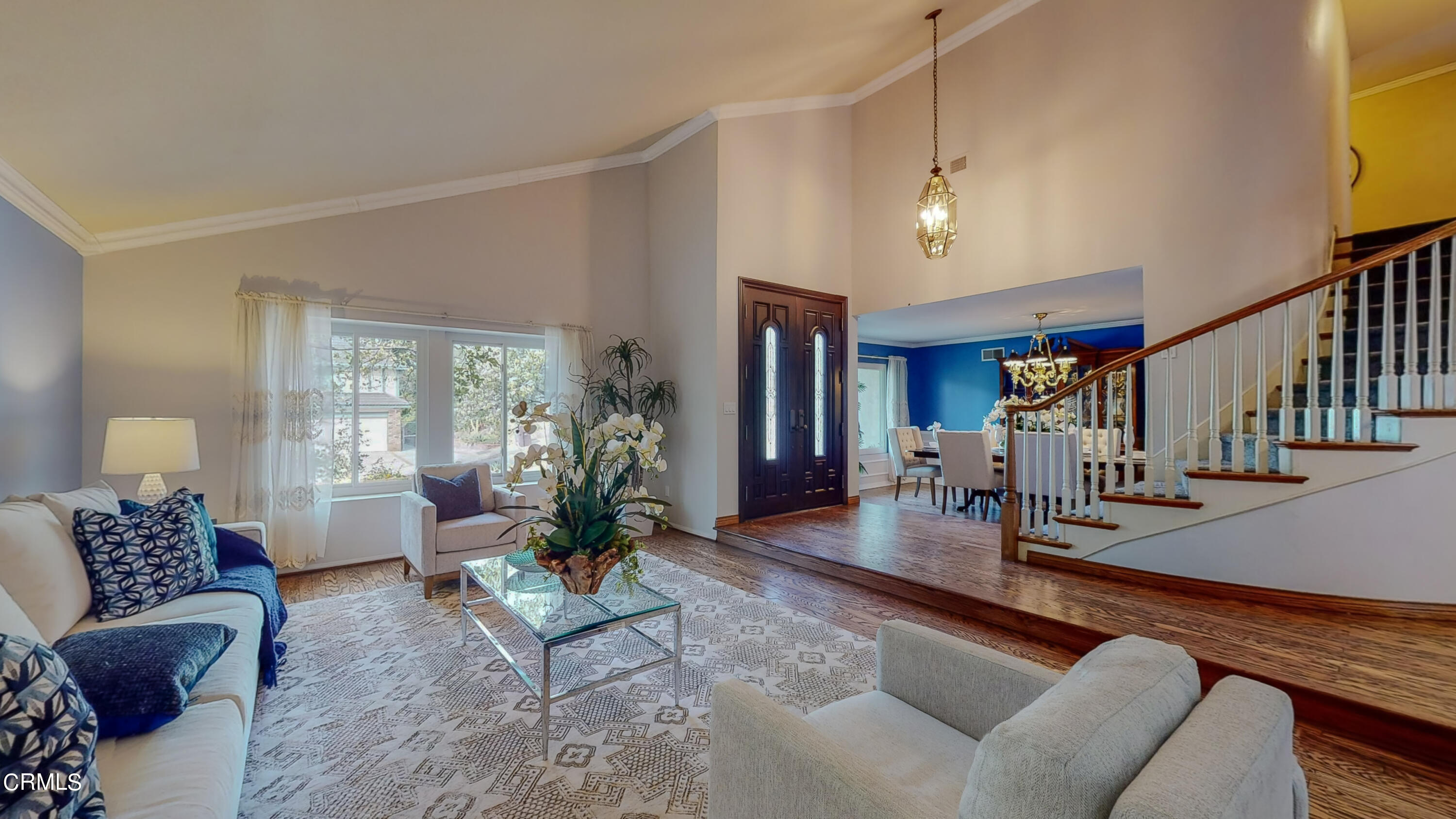 2124 Lenore Drive Glendale, CA 91206 - Photo 5 of 33 a living room with furniture and a chandelier