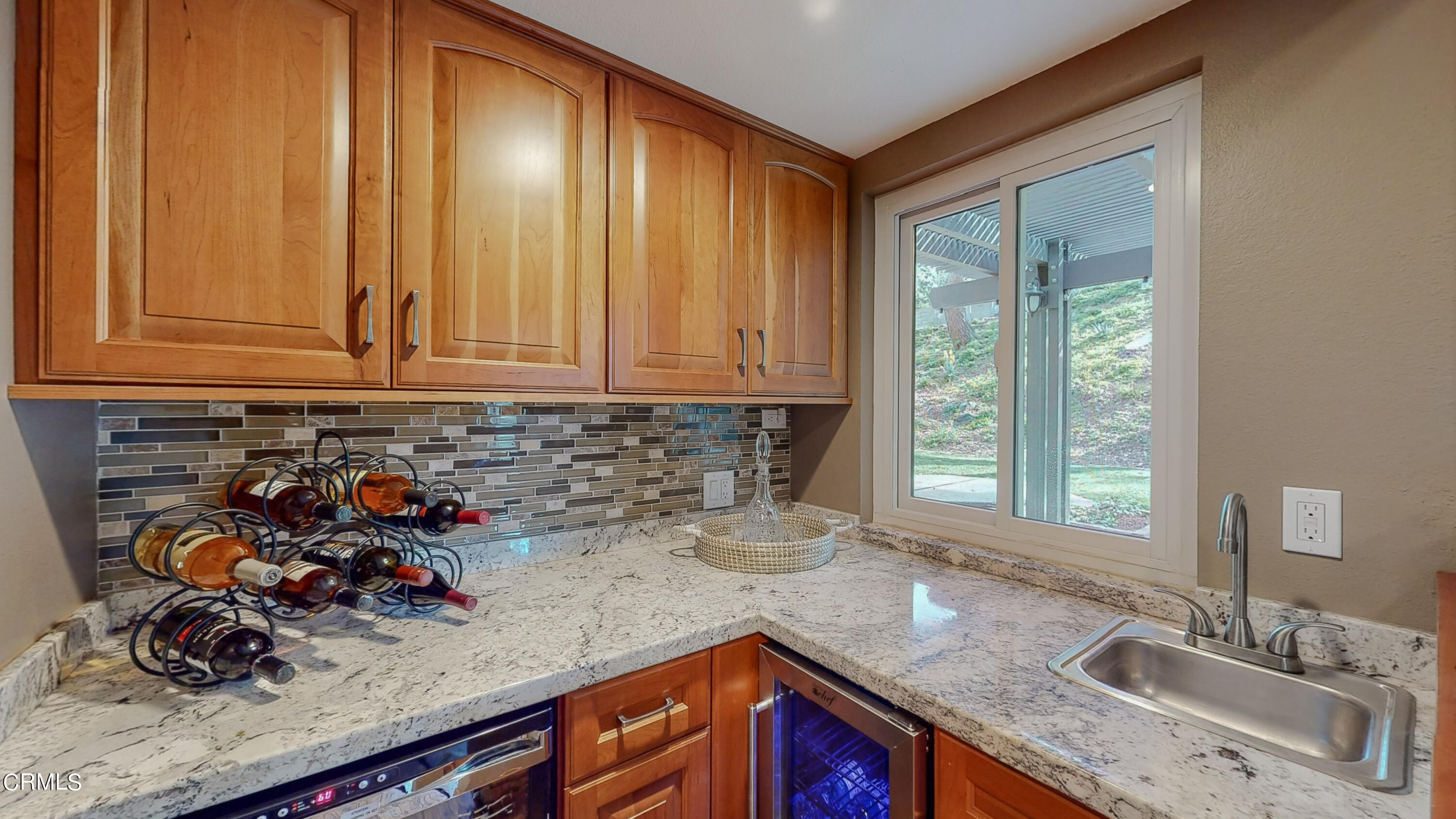 2124 Lenore Drive Glendale, CA 91206 - Photo 9 of 33 a kitchen with sink a window and cabinets